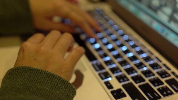 4k女人的手在键盘上敲打笔记本电脑