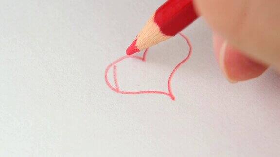 用红铅笔在白画纸上画心艺术