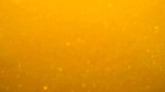 金波背景艺术黄金背景金色的沙子灰尘创造抽象的云的形成缓慢的运动黄金材质惊人的变形闪亮闪亮的粒子散焦模糊散焦