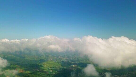鸟瞰雨林山透过云层4KDCI