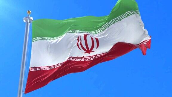伊朗国旗在蓝天中缓缓飘扬盘旋