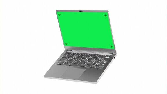 银色笔记本电脑白底绿屏