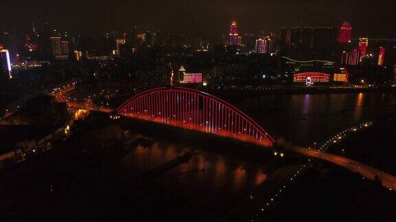 夜景照亮武汉城市滨江大酒店和桥梁航拍4k中国全景
