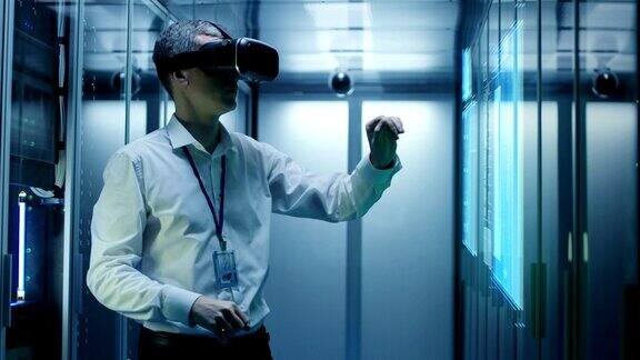 戴着VR眼镜的人在数据中心工作