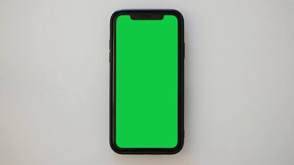 单键点击绿屏iPhone白色桌面背景