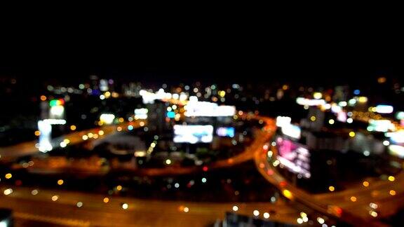 城市夜间交通灯背景的抽象模糊散景泰国曼谷4k决议