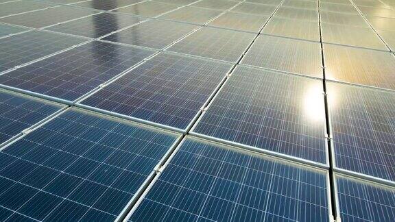 蓝色光伏太阳能板表面的特写安装在建筑屋顶上产生清洁的生态电力生产可再生能源