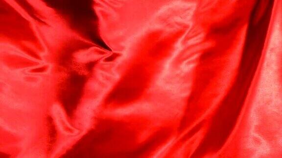 红缎面料随风飘动抽象背景