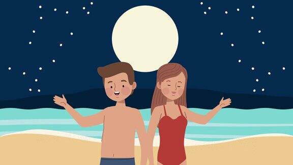 晚上海滩上的年轻夫妇