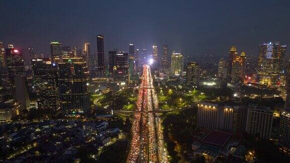 夜间照明市区雅加达城市交通街道道路航拍全景4k延时印尼