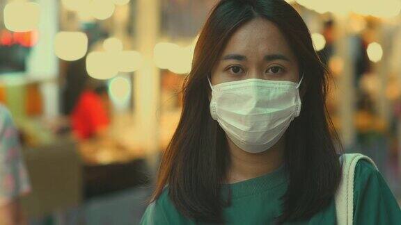 戴卫生口罩的亚洲妇女