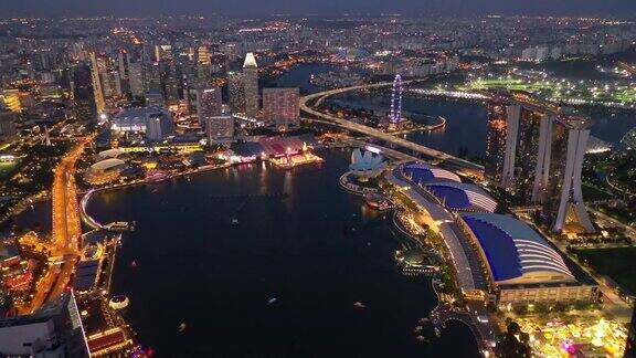 黄昏时间照明新加坡城市著名的滨海湾航拍全景4k