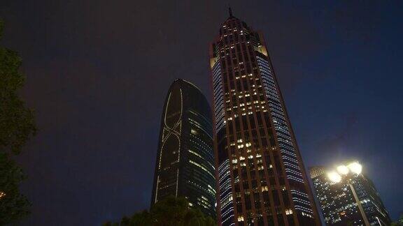 夜光照亮广州市区著名的摩天大楼全景4k中国