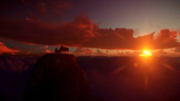 一个人在山顶上弹钢琴在美丽的日落无人机观看4K