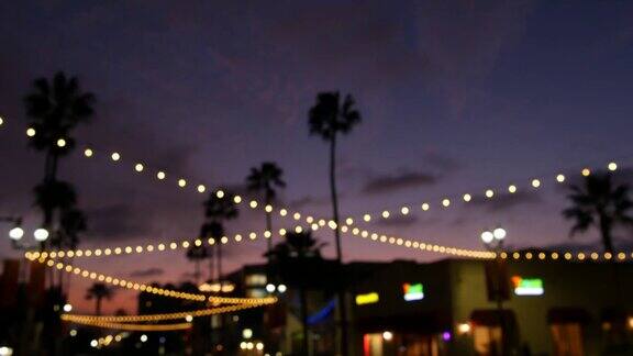 电动花环棕榈树美国加州海滩日落海岸黄昏天空洛杉矶的灯