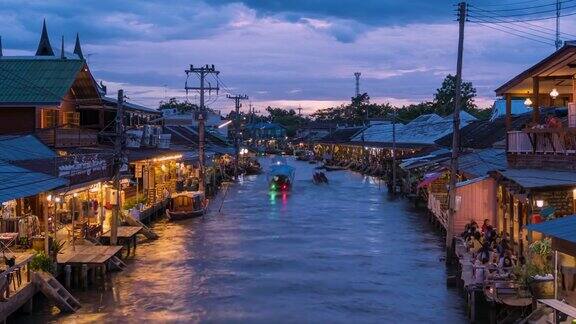 黄昏时分的安帕瓦运河和村庄著名传统水上市场、文化旅游目的地泰国沙慕宋卡兰;放大-延时