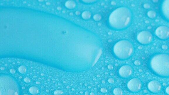 水滴气泡背景抽象的蓝色背景特写宏观有选择性的重点