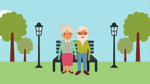 一对老夫妇坐在公园的长椅上