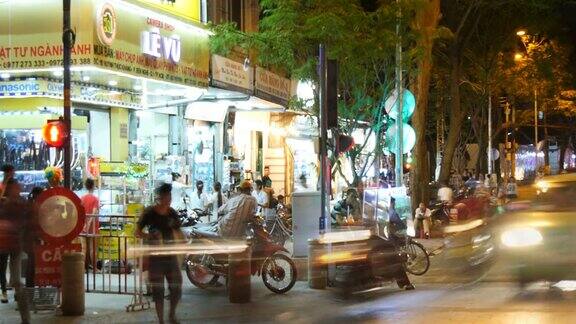 胡志明西贡越南-2015年:亚洲城市街头交通夜晚时光流逝