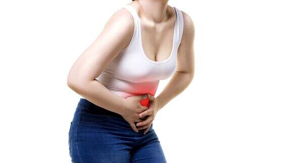 腹部疼痛的妇女腹部疼痛的白色背景