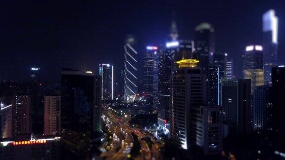 夜间灯光照亮了广州市区交通道路倾斜4k中国航拍全景图