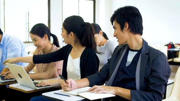 一群亚洲学生正在课堂上学习学习和教育理念