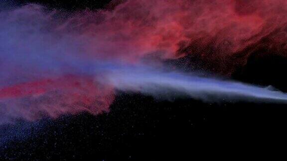 紫色和红色的粉末在空中碰撞慢镜头