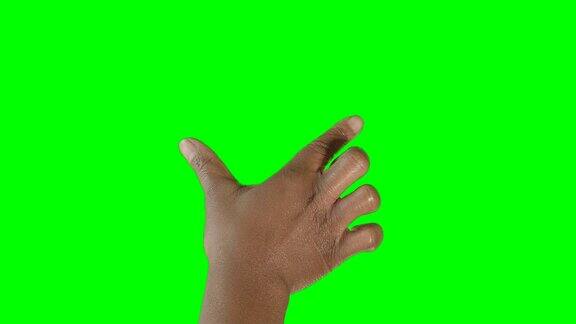 非裔美国人用手点击绿色屏幕