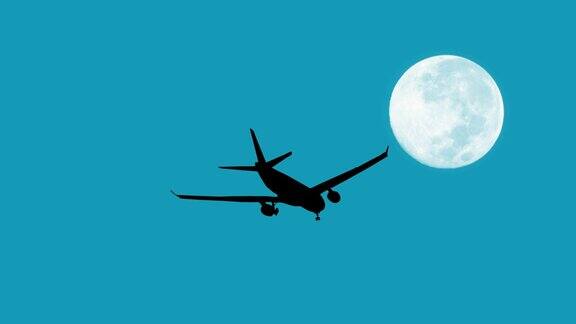 在月亮的蓝色背景上飞行的飞机