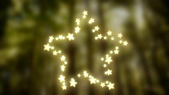 在散焦的背景上发光的仙女灯的星星