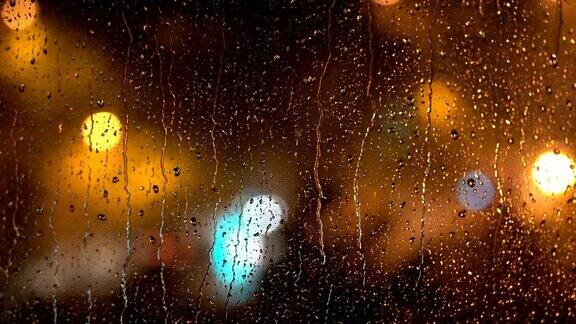 暴风雨中的夜城-透过公寓窗户看