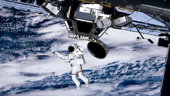 宇航员太空行走在空地上挥手国际空间站围绕地球大气层旋转这段视频由美国宇航局提供