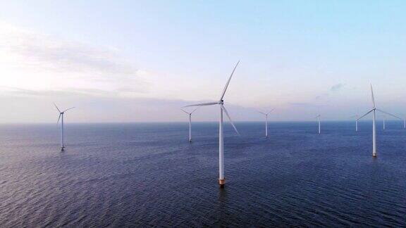 鸟瞰荷兰风车公园日落时分绿色能源风车涡轮机