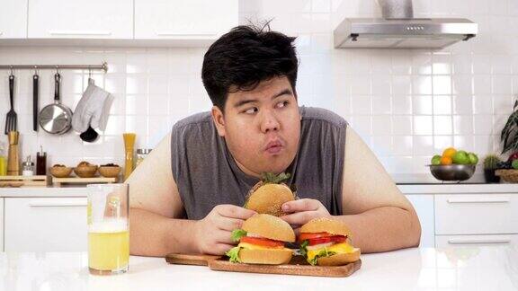 泰国超重男子吝啬汉堡包他只想吃他