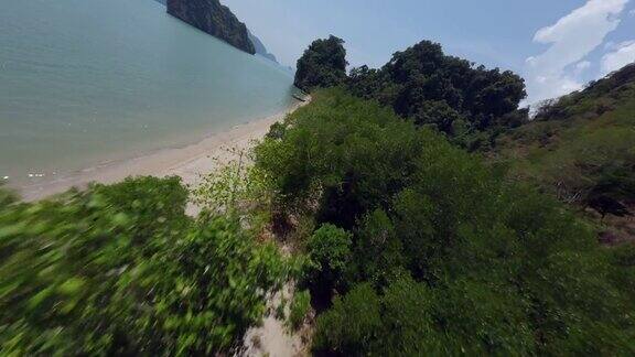 鸟瞰图电影亚洲天堂岛沙滩长尾船游客飞近山