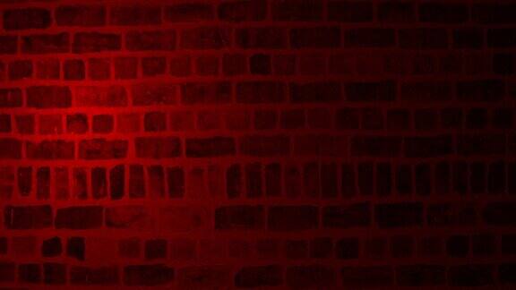 聚光灯照在砖墙上白灰浆染红