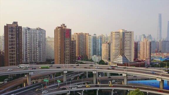 中国晴天上海城市景观交通路口四周航拍全景4k