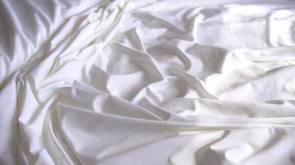 背景纹理柔软的白色织物织物材料反向移动