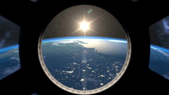 从国际空间站窗口看到的日出