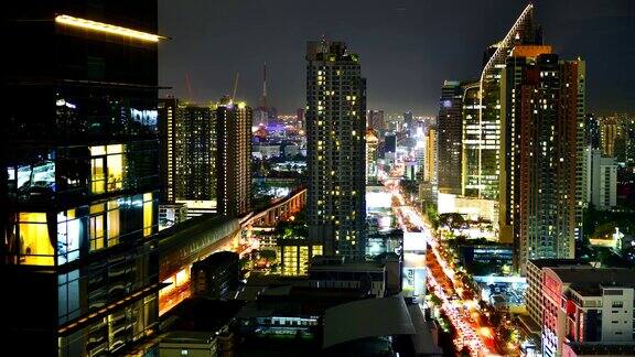 时间流逝夜景城市景观商业现代建筑在曼谷