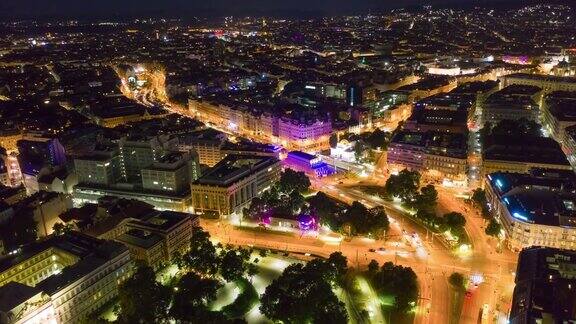 维也纳市中心夜间灯火通明的交通街道空中全景4k时间跨度的奥地利