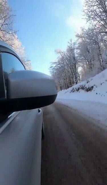 驾车穿过雪原森林