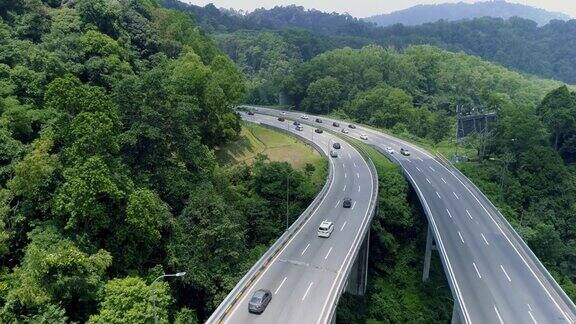 航拍大山中的两条高速公路