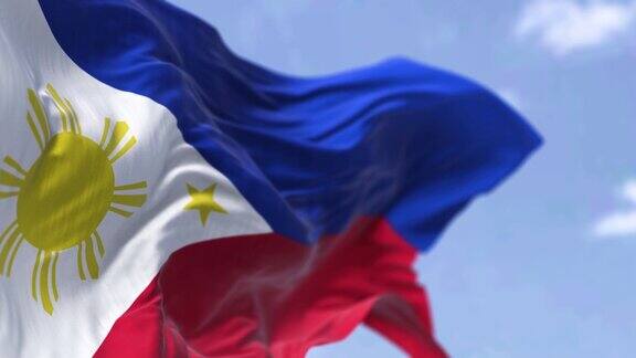 在一个晴朗的日子里菲律宾国旗在风中飘扬