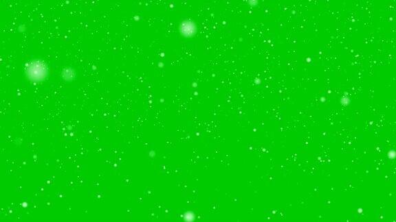 雪花落向孤立的绿色(循环4k+色度键)