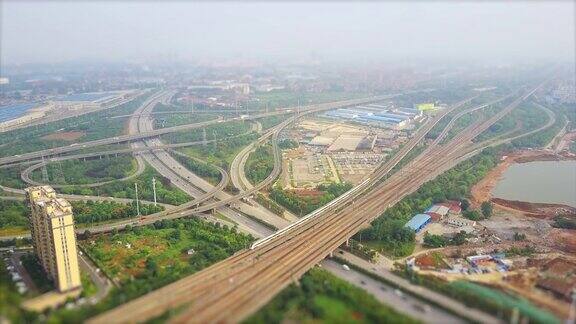 白天武汉市车流交接处空中全景4k倾斜移位中国