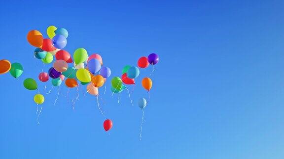 许多气球飘向湛蓝的天空
