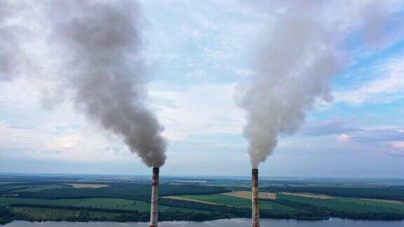 工业烟尘造成的大气污染工厂产生化学烟雾的管道浓烟和蒸汽污染环境气候变化和全球变暖