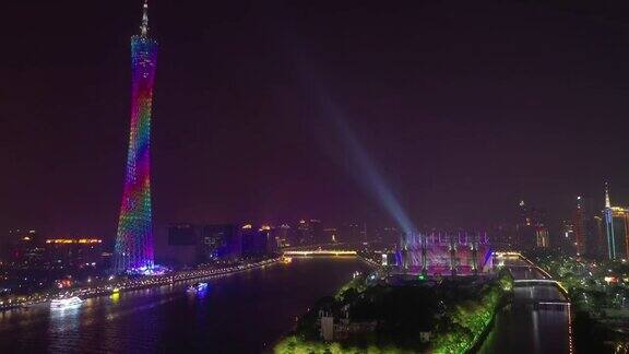 夜间照明著名的广州市市中心滨江湾塔演唱会体育场航拍全景4k中国