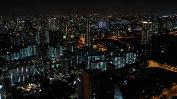 新加坡城市景观飞行夜间照明生活区空中全景4k